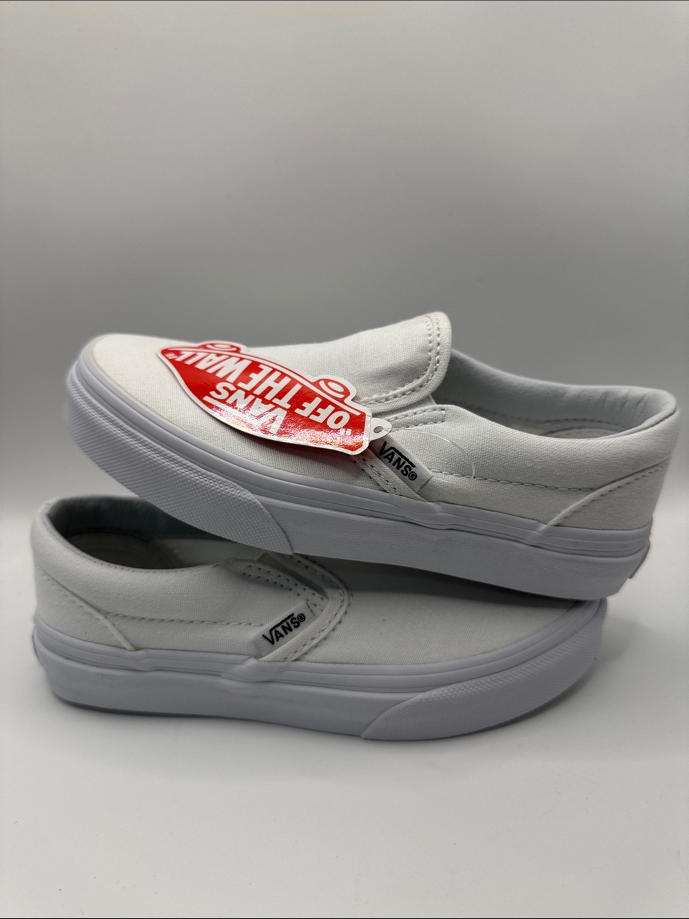Vans Kids Slip-On Canvas Sneakers in White